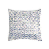 Cuscino sanitario bianco con delicate forme blu