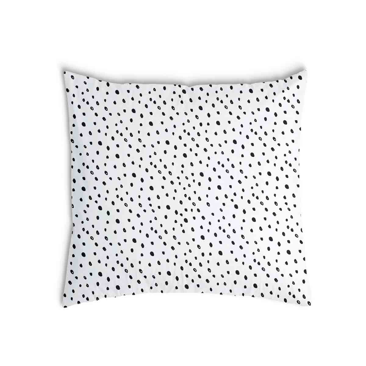 Cuscino sanitario bianco con molti piccoli puntini
