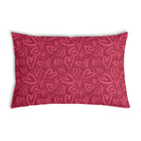 Cuscino sanitario rosso con motivo a cuore rosa