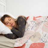 Set di biancheria da letto con coperta terapeutica beige con volto astratto