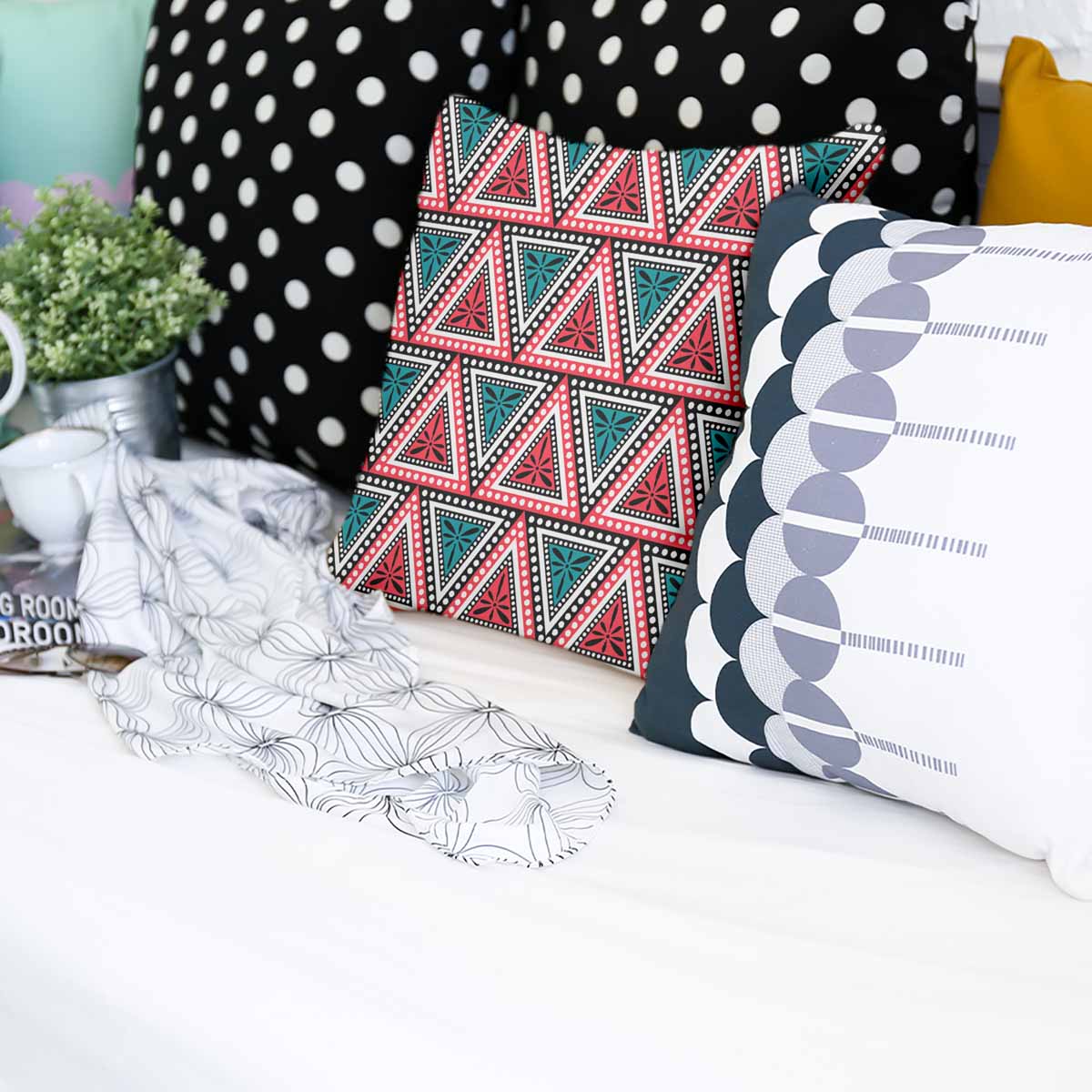 Cuscino sanitario con triangoli colorati