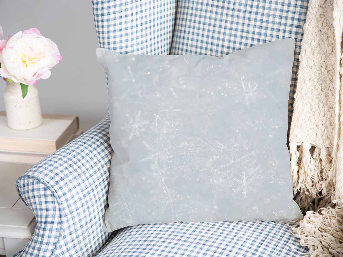 Cuscino sanitario grigio con fiocchi di neve