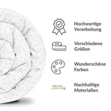 Set di biancheria da letto con coperte terapeutiche e delicati mazzi di fiori