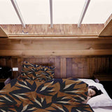 Set di biancheria da letto con coperta terapeutica marrone con foglie blu