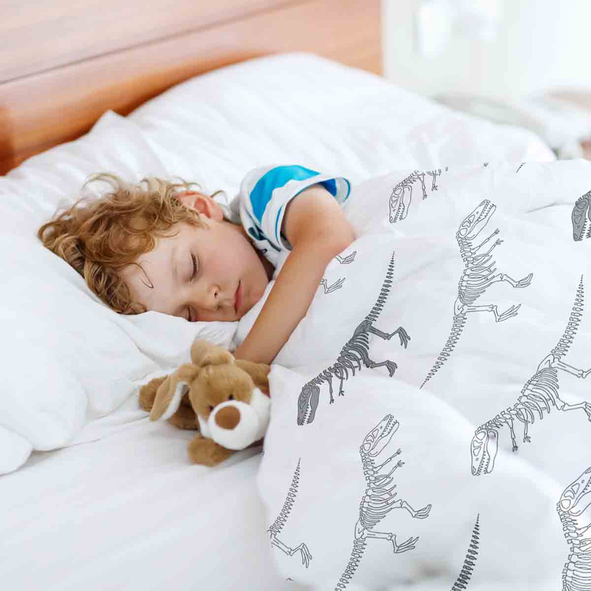 Set di biancheria da letto con coperta terapeutica bianca con scheletro di dinosauro