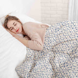 Set di biancheria da letto con coperte terapeutiche bianco con delicate forme blu