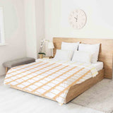 Set di biancheria da letto con coperta terapeutica gialla a quadri