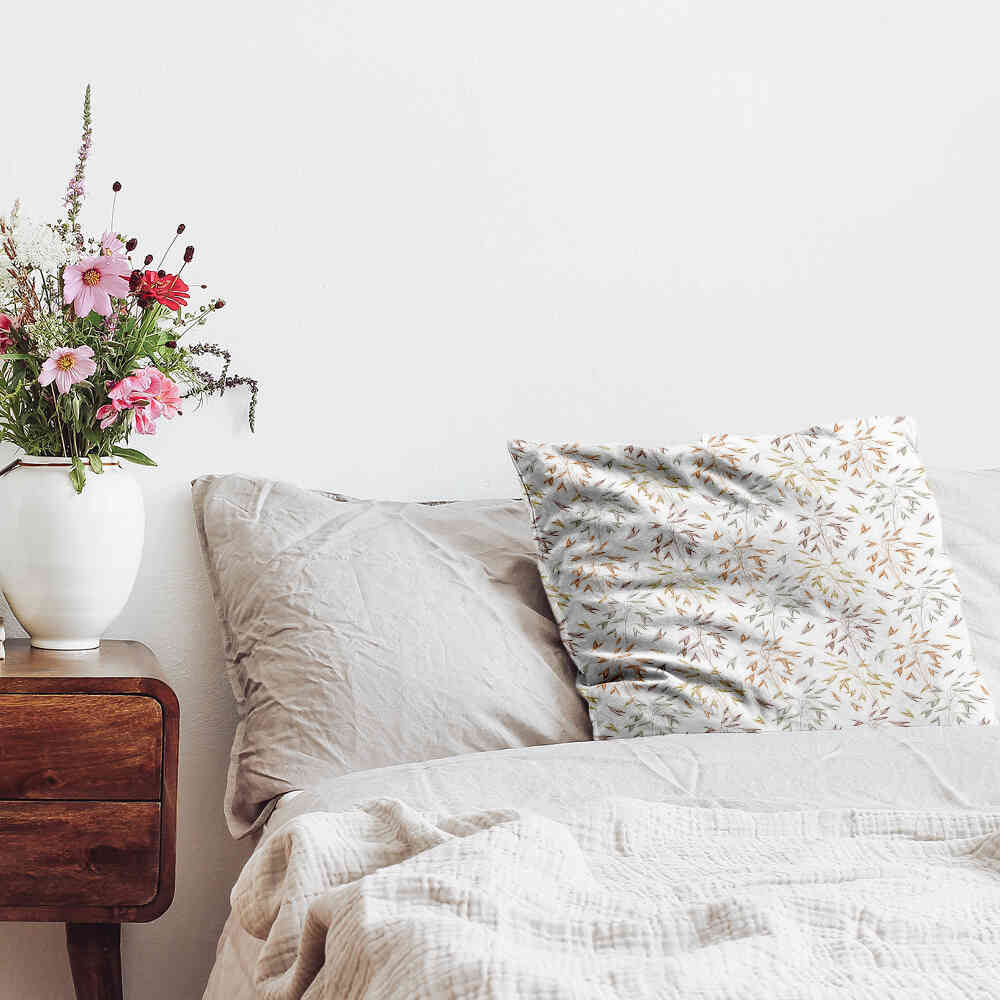 Cuscino per la salute con delicati rami colorati