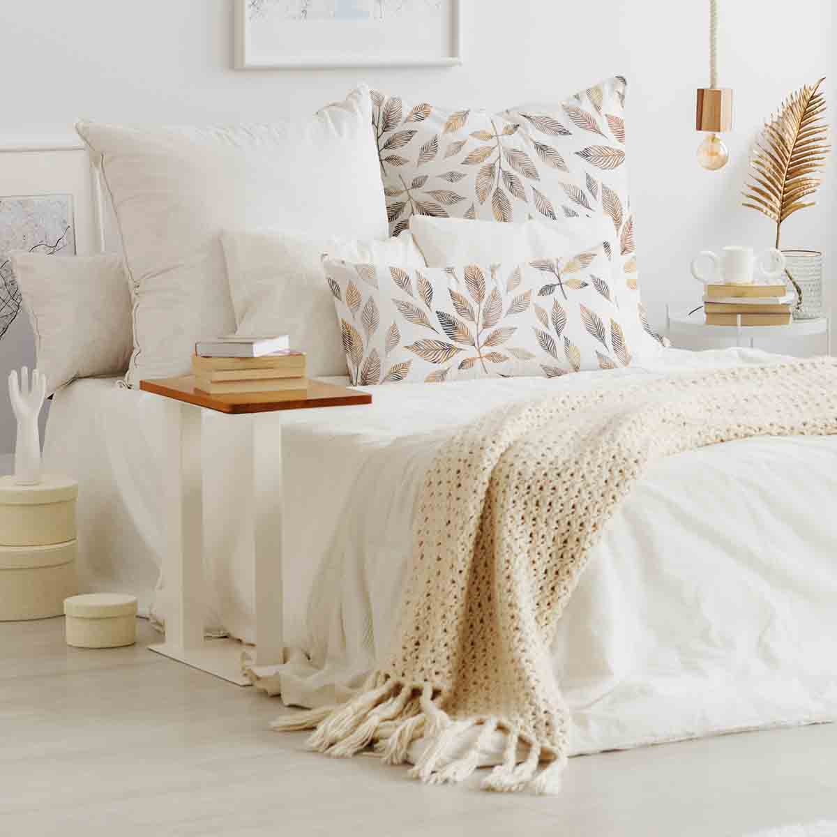 Cuscino sanitario bianco con rami marrone chiaro