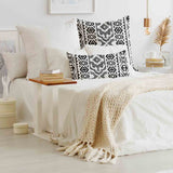 Cuscino sanitario con forme nere