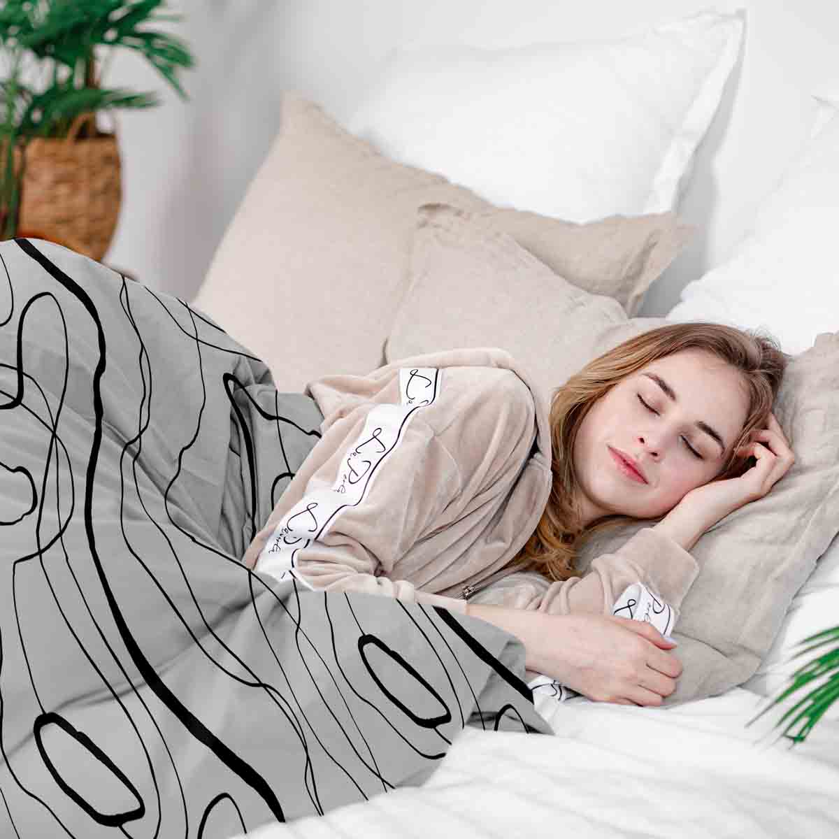 Set di biancheria da letto con coperte terapeutiche e linee serpentine nere