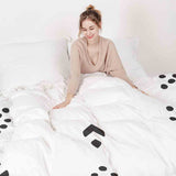 Set di biancheria da letto con coperta terapeutica bianca con motivo a freccia nera