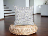 Cuscino sanitario bianco con delicate forme blu