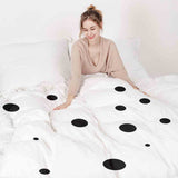 Set di biancheria da letto con coperta terapeutica a pois dalmata