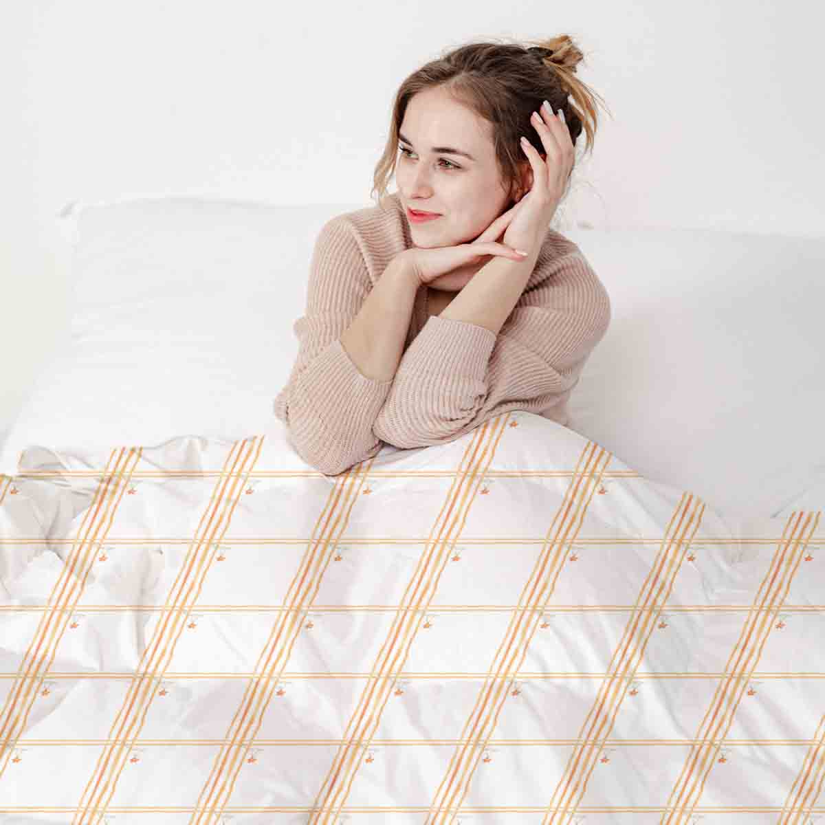 Set di biancheria da letto con coperta terapeutica gialla a quadri