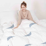Set di biancheria da letto con coperte terapeutiche bianco con onde blu