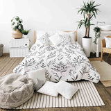 Set di biancheria da letto con coperte terapeutiche bianco con rami neri