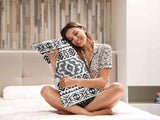 Cuscino sanitario con forme nere