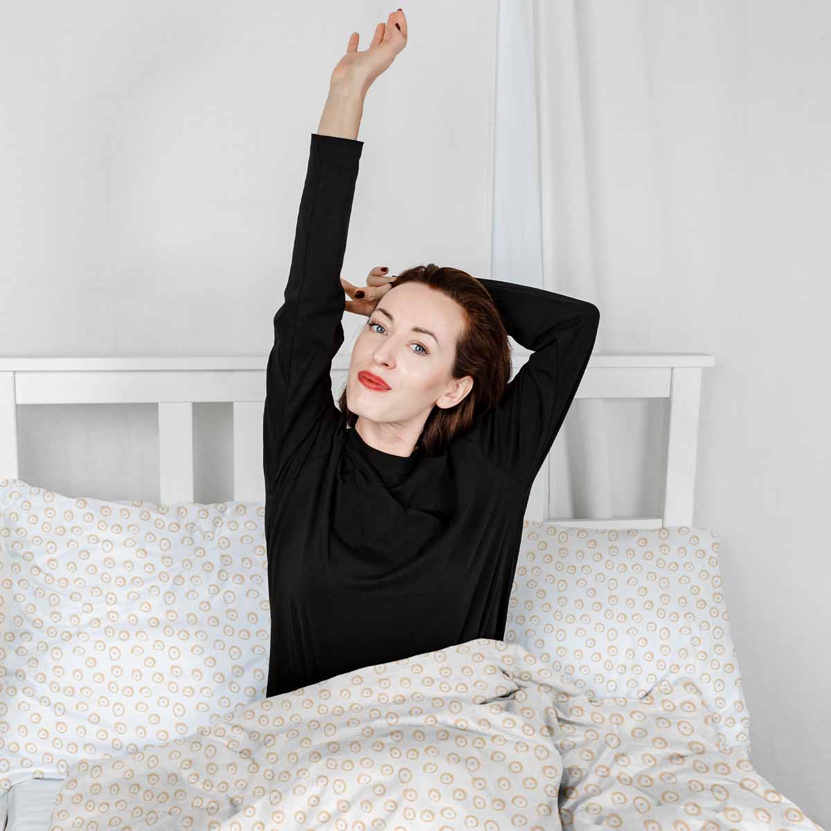 Set di biancheria da letto con coperte terapeutiche e cerchi arancioni