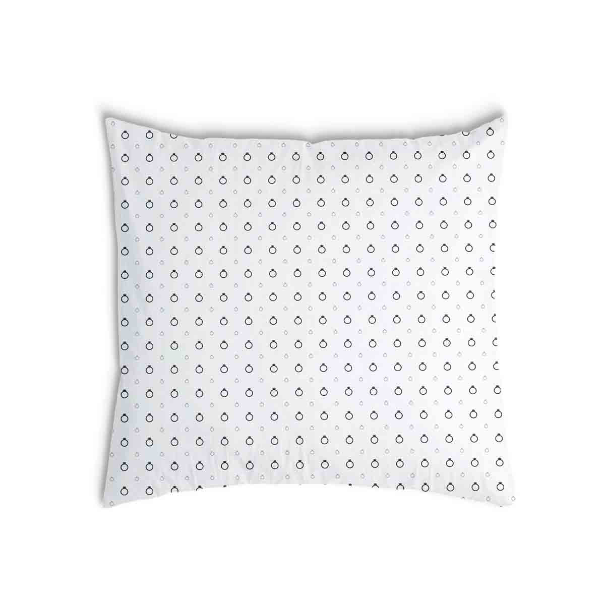 Cuscino salute bianco con anelli di fidanzamento