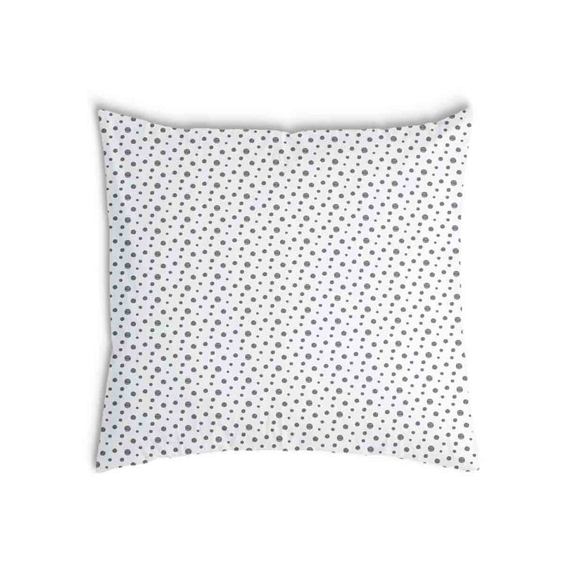 Cuscino sanitario bianco con molti punti grigi