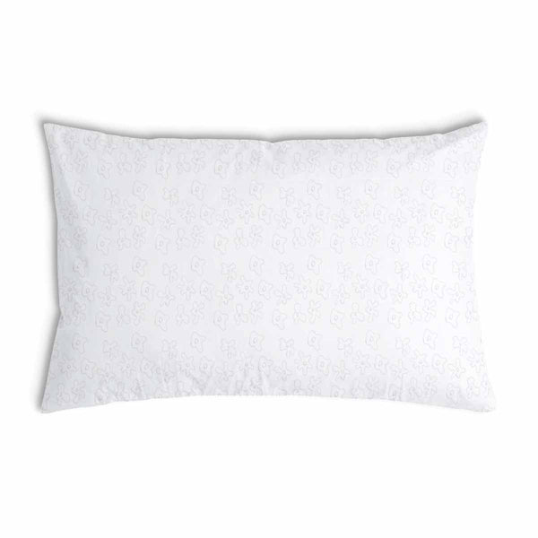 Cuscino sanitario bianco con delicati fiori