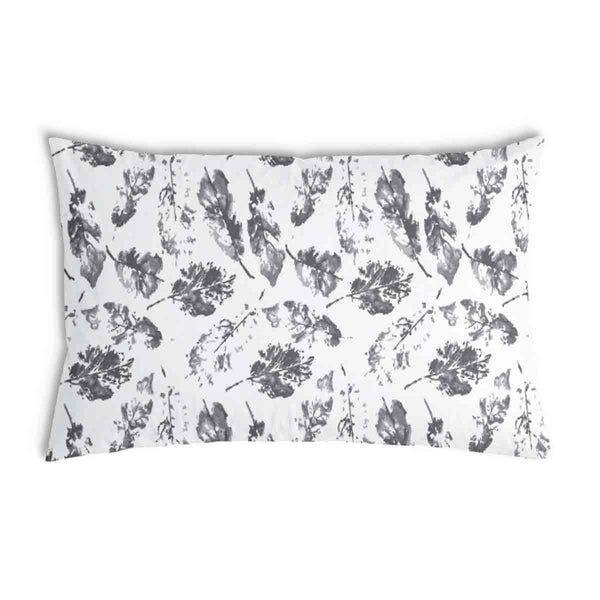 Cuscino sanitario bianco con foglie grigie
