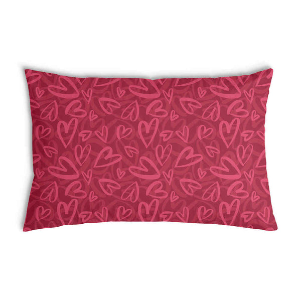 Cuscino sanitario rosso con motivo a cuore rosa