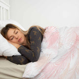 Set di biancheria da letto con coperta terapeutica bianca con piume rosa
