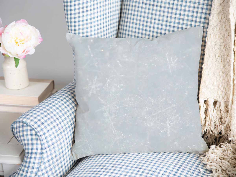 Cuscino sanitario grigio con fiocchi di neve