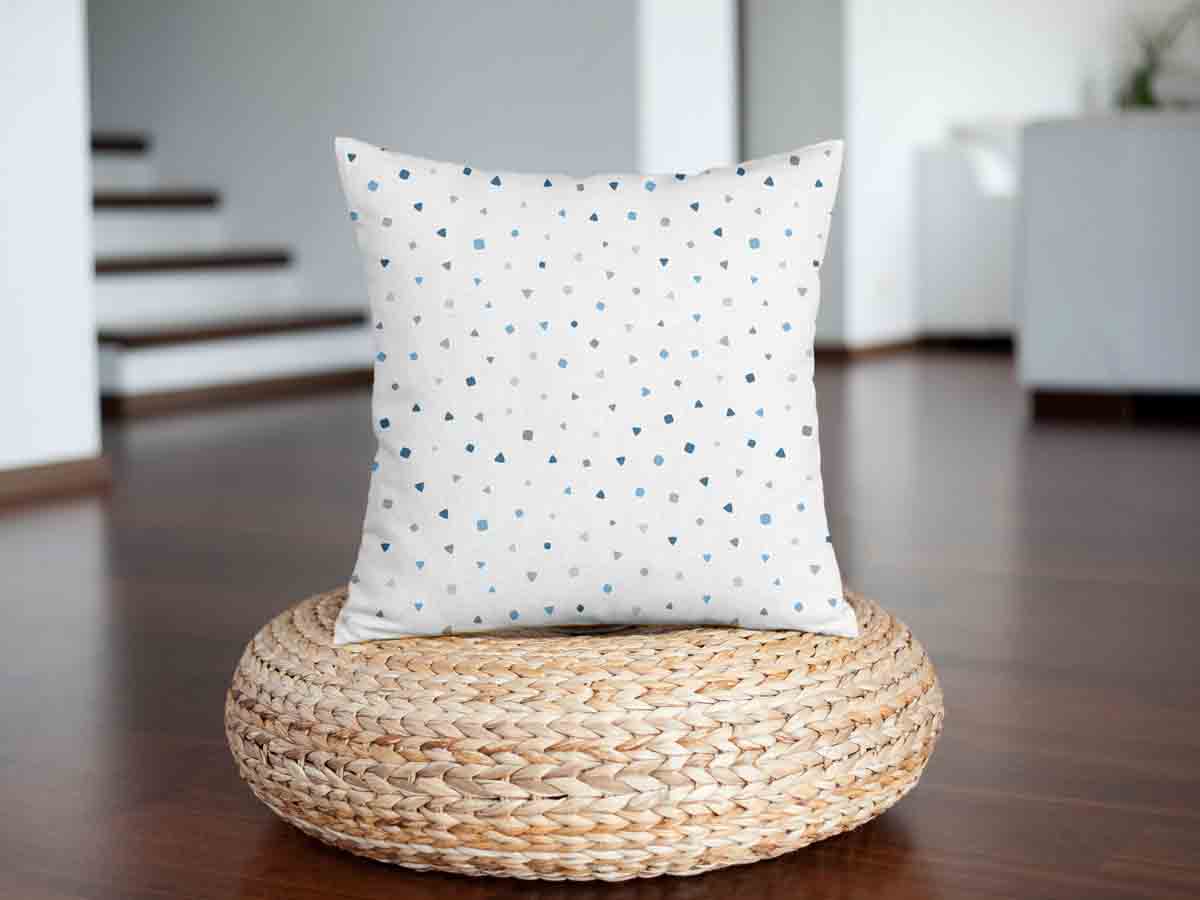 Cuscino sanitario bianco con piccole forme blu