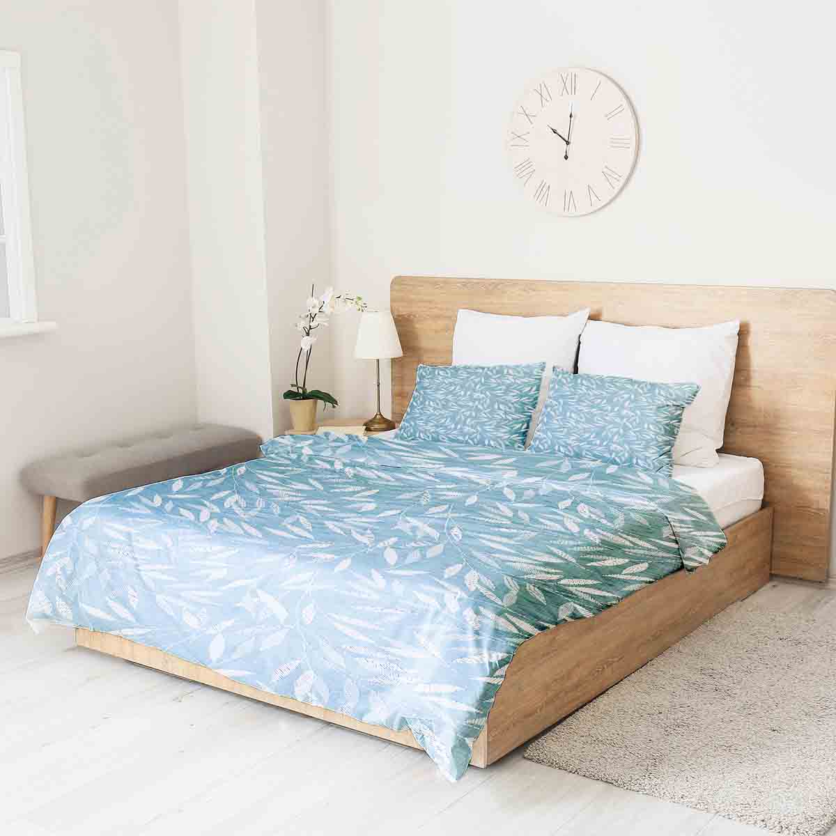 Set di biancheria da letto con coperte terapeutiche e rami blu