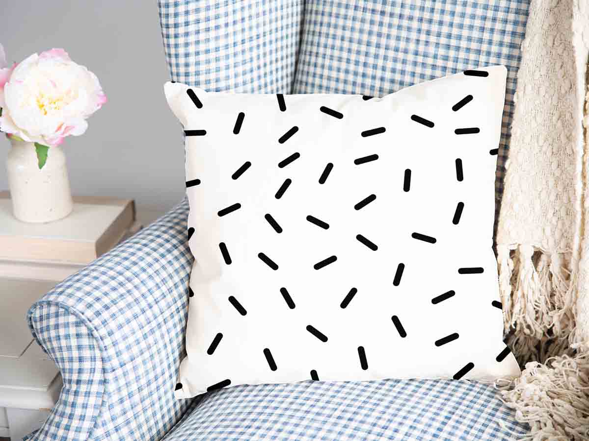 Cuscino sanitario bianco con strisce nere