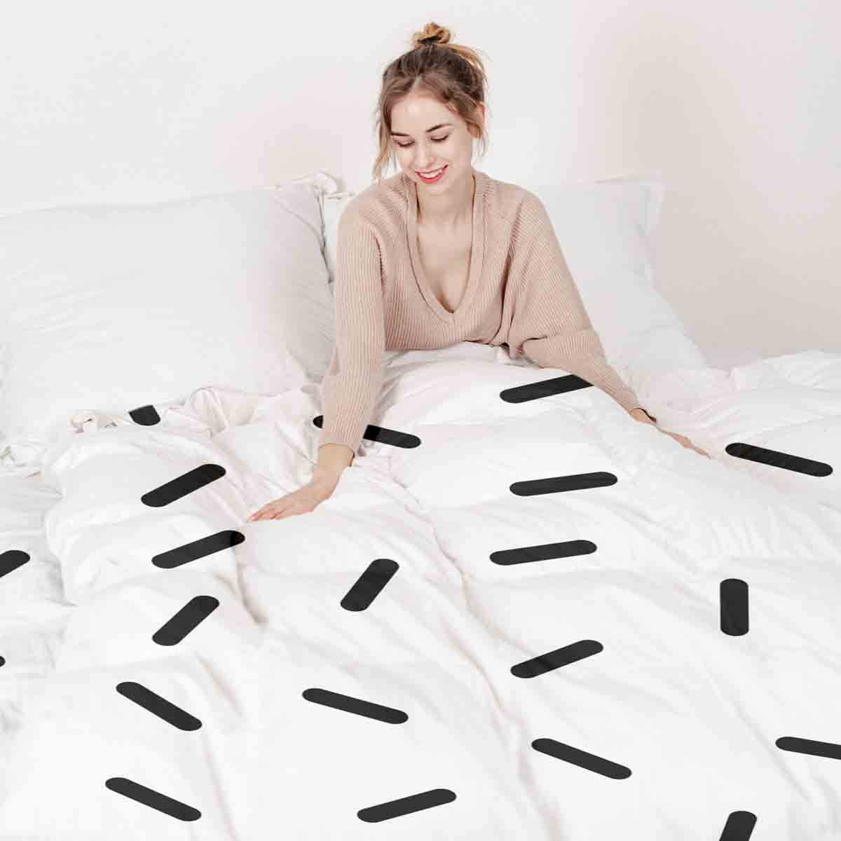 Set di biancheria da letto con coperte terapeutiche e strisce nere