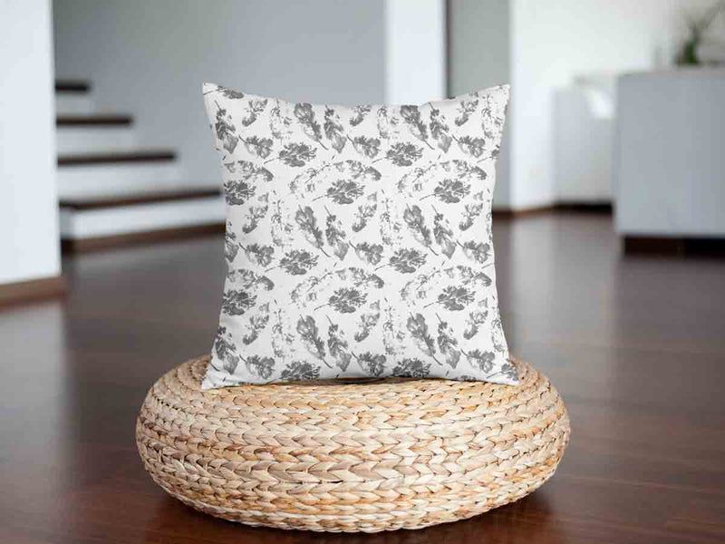 Cuscino sanitario bianco con foglie grigie