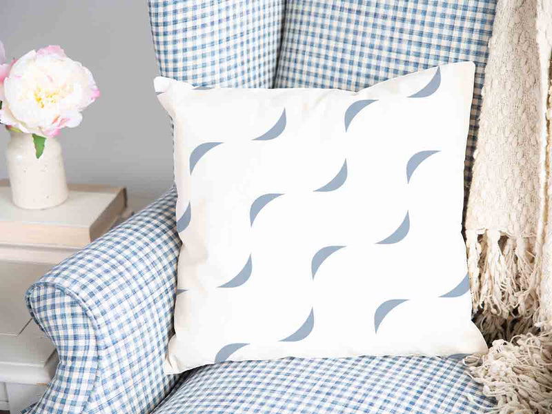 Cuscino sanitario bianco con onde blu