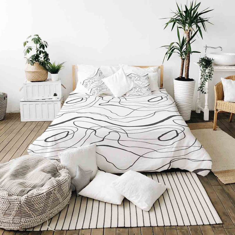 Set di biancheria da letto con coperte terapeutiche e linee serpentine nere