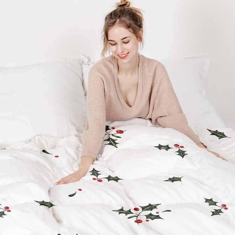 Set di biancheria da letto con coperta terapeutica bianca e rametti di vischio