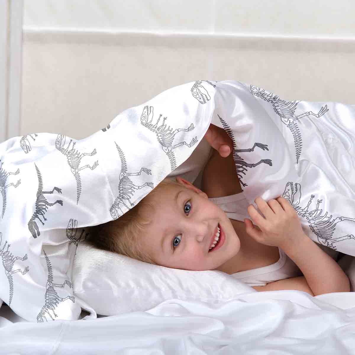 Set di biancheria da letto con coperta terapeutica bianca con scheletro di dinosauro